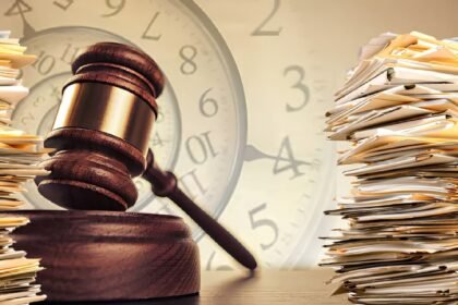 Gavel beside a clock and stacked case files, symbolizing decades-old court case backlogs the new bar leadership has pledged to clear
