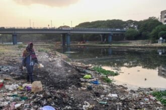 Polluted Mula-Mutha riverbank in Pune littered with municipal waste, site of the NGT's dumping investigation