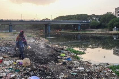 Polluted Mula-Mutha riverbank in Pune littered with municipal waste, site of the NGT's dumping investigation