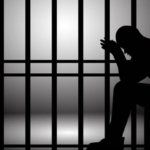 Silhouette of a person behind jail bars, symbolizing the wrongful 88-day detention in the Lonavala identity mix-up case