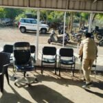 Office chairs and furniture removed from the Pune PWD office and placed outdoors during a court-ordered attachment