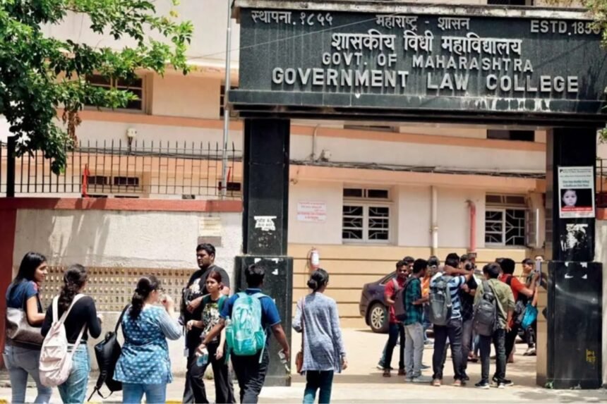 Students gathered outside the Government Law College building gate