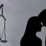 Lady Justice statue beside a silhouette of a couple standing close together, symbolizing a live-in relationship case